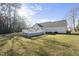 The expansive backyard features a lattice deck at 63 Halter Ct, Angier, NC 27501