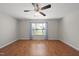 Bedroom with lots of light, ceiling fan, and hardwood flooring at 63 Halter Ct, Angier, NC 27501