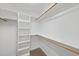 Walk-in closet with ample shelving for storage and organization at 63 Halter Ct, Angier, NC 27501