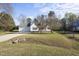 This home has a driveway leading to a two-car garage at 63 Halter Ct, Angier, NC 27501