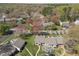 A beautiful aerial view of a residential neighborhood with mature trees and well-kept lawns at 6817 Fairpoint Ct, Raleigh, NC 27613