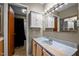 Bathroom with vanity, mirror, and bathtub with shower at 71 Romans Rd, Roxboro, NC 27574