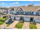 Birds eye view of beautiful townhomes in a neighborhood complete with lush green lawns at 946 Consortium Dr, Raleigh, NC 27603
