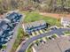 Aerial view of a well-maintained neighborhood with lush green spaces and manicured lawns at 946 Consortium Dr, Raleigh, NC 27603