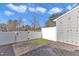 Fenced backyard featuring a patio with decorative string lights, great for outdoor entertaining at 946 Consortium Dr, Raleigh, NC 27603