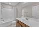 Clean bathroom features a shower/tub combo, white fixtures, and a vanity with ample storage at 946 Consortium Dr, Raleigh, NC 27603