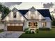 Charming two-story home showcasing a modern design, meticulous landscaping, and a welcoming entrance at Lot 21H Good Shepherd Trl, Spring Hope, NC 27882