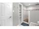 Updated bathroom with a walk-in shower, built-in shelves, and modern fixtures at 1022 Glover Rd, Dunn, NC 28334