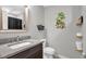 Bathroom featuring a sink with stone countertops at 1022 Glover Rd, Dunn, NC 28334