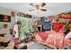 Bright bedroom with an easel and large window at 1022 Glover Rd, Dunn, NC 28334