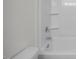 Clean bathroom featuring a white tub and shower combo with chrome fixtures at 104 Fairwinds Dr, Lillington, NC 27546