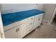 Bathroom vanity with white cabinets and chrome hardware at 104 Fairwinds Dr, Lillington, NC 27546