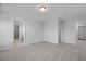 Bright bedroom boasts neutral tones and plush carpeting, creating a serene and inviting space at 104 Fairwinds Dr, Lillington, NC 27546