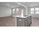 Bright living room area with gray walls and lots of windows at 104 Fairwinds Dr, Lillington, NC 27546