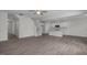 Open concept living space with wood-look floors and plenty of natural light at 104 Fairwinds Dr, Lillington, NC 27546