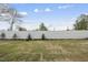 Backyard with a newly installed fence and healthy grass at 104 Ripple Way # 318, Clayton, NC 27520