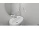 Modern half bathroom featuring a pedestal sink, neutral paint, and an oval mirror above the sink at 104 Ripple Way # 318, Clayton, NC 27520