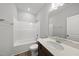 Bathroom featuring a vanity with white countertop, a large mirror, and a shower-tub combination at 104 Ripple Way # 318, Clayton, NC 27520