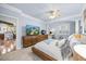 Comfortable bedroom with light blue walls and adjoining room at 10400 Rosegate Ct # 3, Raleigh, NC 27617