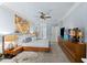 Expansive main bedroom with modern furnishings, a large bed, and a sleek TV console at 10400 Rosegate Ct # 3, Raleigh, NC 27617