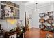 Modern entryway with a decorative display shelf featuring artwork, sculptures, and modern lighting at 10400 Rosegate Ct # 3, Raleigh, NC 27617