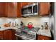 Modern kitchen featuring stainless steel range and granite countertops at 10400 Rosegate Ct # 3, Raleigh, NC 27617