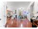Spacious open concept living and dining area with hardwood floors and a fireplace feature at 10400 Rosegate Ct # 3, Raleigh, NC 27617