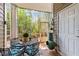 Screened in patio with wooded views and dining table at 10400 Rosegate Ct # 3, Raleigh, NC 27617