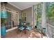 Covered outdoor patio with comfortable seating and attractive decor at 10400 Rosegate Ct # 3, Raleigh, NC 27617