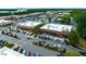 Overhead view of a shopping center with popular businesses, landscaped islands and ample parking at 10400 Rosegate Ct # 3, Raleigh, NC 27617