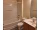 Functional bathroom featuring a tub-shower combination and a wooden vanity with sink at 11711 Mezzanine Dr # 109, Raleigh, NC 27614