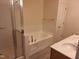Bathroom featuring a tub, a separate shower, and a dual sink vanity at 11711 Mezzanine Dr # 109, Raleigh, NC 27614