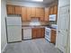 Well-equipped kitchen with ample cabinet space, modern appliances, and durable countertops at 11711 Mezzanine Dr # 109, Raleigh, NC 27614
