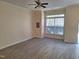 Sunlit living room with big windows and durable floors at 11711 Mezzanine Dr # 109, Raleigh, NC 27614