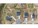 Aerial view of the property showcasing the well-manicured backyard, patio, and outdoor amenities at 118 Lockhaven Dr, Garner, NC 27529