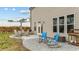 Outdoor patio area with seating, a dining table, and ample space for relaxation and entertainment at 118 Lockhaven Dr, Garner, NC 27529