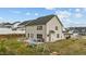 Extensive backyard with a patio, dining area, and space for recreation and play equipment at 118 Lockhaven Dr, Garner, NC 27529