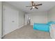 Bedroom featuring double closets, ceiling fan and carpet flooring at 118 Lockhaven Dr, Garner, NC 27529