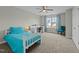 Bedroom featuring a writing desk, ceiling fan and a large window at 118 Lockhaven Dr, Garner, NC 27529