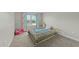 Bedroom featuring a toddler bed with carpet flooring and decorated with fun, playful curtains at 118 Lockhaven Dr, Garner, NC 27529