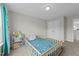 Bedroom featuring a toddler bed and bookshelf with toys and books at 118 Lockhaven Dr, Garner, NC 27529