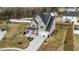 Beautifully landscaped two-story home with a spacious front yard and welcoming covered front porch at 118 Lockhaven Dr, Garner, NC 27529