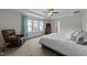 Spacious main bedroom featuring large windows, and a sitting area at 118 Lockhaven Dr, Garner, NC 27529