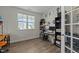 Bright office space featuring natural light, wood flooring, and a neutral color scheme at 118 Lockhaven Dr, Garner, NC 27529