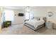 Spacious bedroom with plush carpeting, a stylish bed with pillows, and contemporary furnishings at 1253 Manor Dr, Rocky Mount, NC 27804