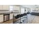 Open concept kitchen and living area with stainless steel dishwasher and granite countertops at 1253 Manor Dr, Rocky Mount, NC 27804