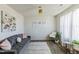 Cozy living room with gray sofa, area rug, and artwork creating an inviting atmosphere at 1253 Manor Dr, Rocky Mount, NC 27804