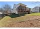 Beautiful backyard has a spacious lawn, screened in porch and mature landscaping, perfect for outdoor activities at 12812 Baybriar Dr, Raleigh, NC 27613
