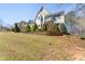 A charming two-story home with a landscaped front yard on a sunny day at 12812 Baybriar Dr, Raleigh, NC 27613