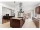 Bright and spacious kitchen open to the living area with stainless steel range at 12812 Baybriar Dr, Raleigh, NC 27613